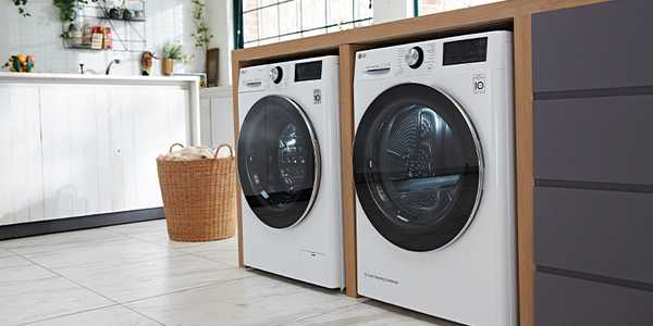 Two LG washing machines in a laundry room.
